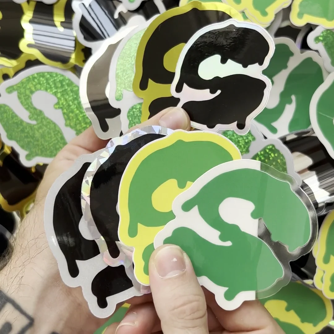 Close-up of multiple-design stickers with different finishes and materials